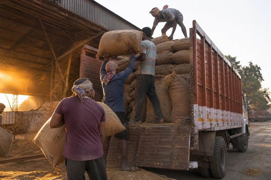 Loading bags onto a truck